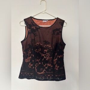 Vintage Fredricks of Hollywood orange and black blouse